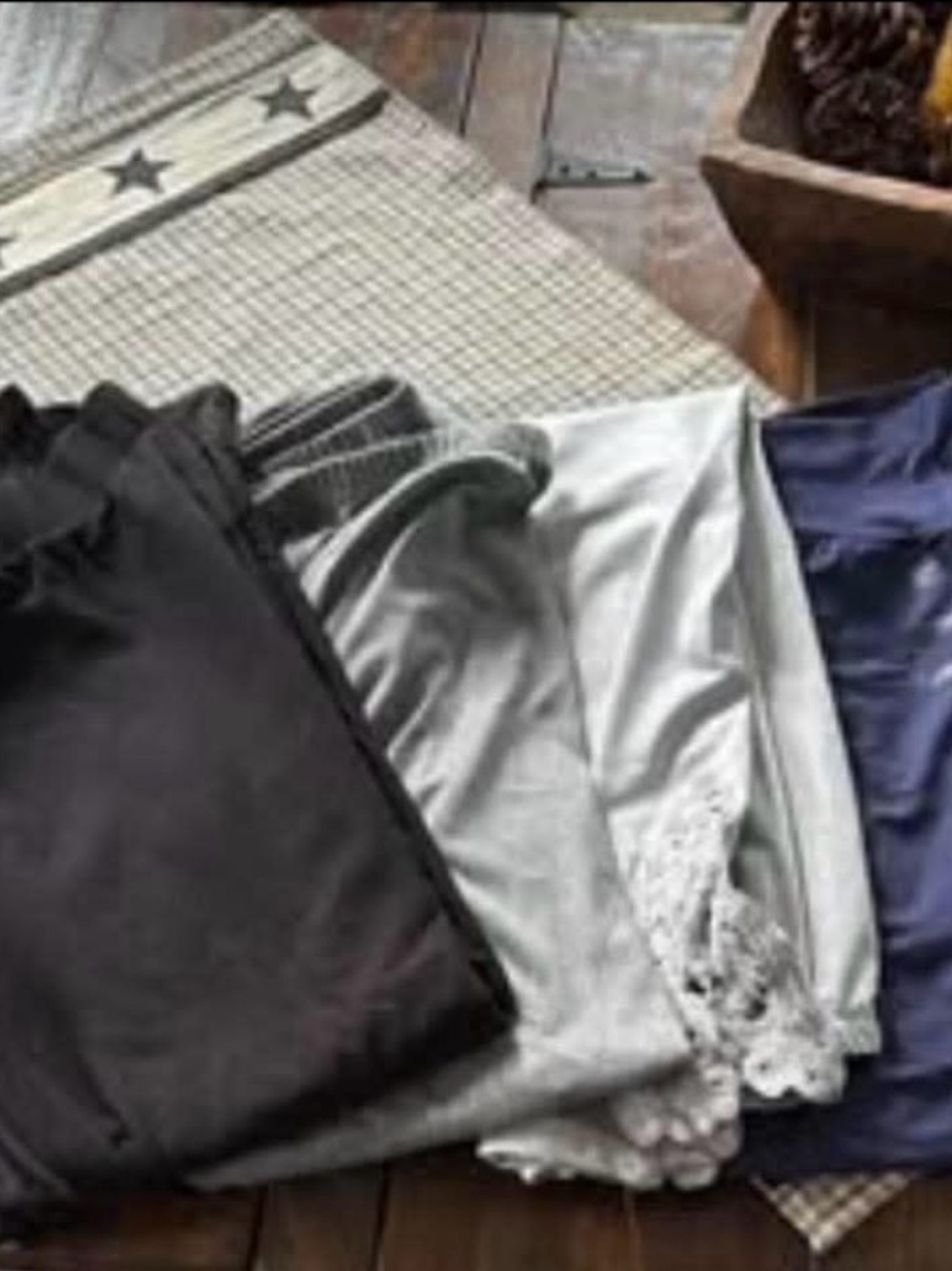 4 different leggins one black two gray and one navy